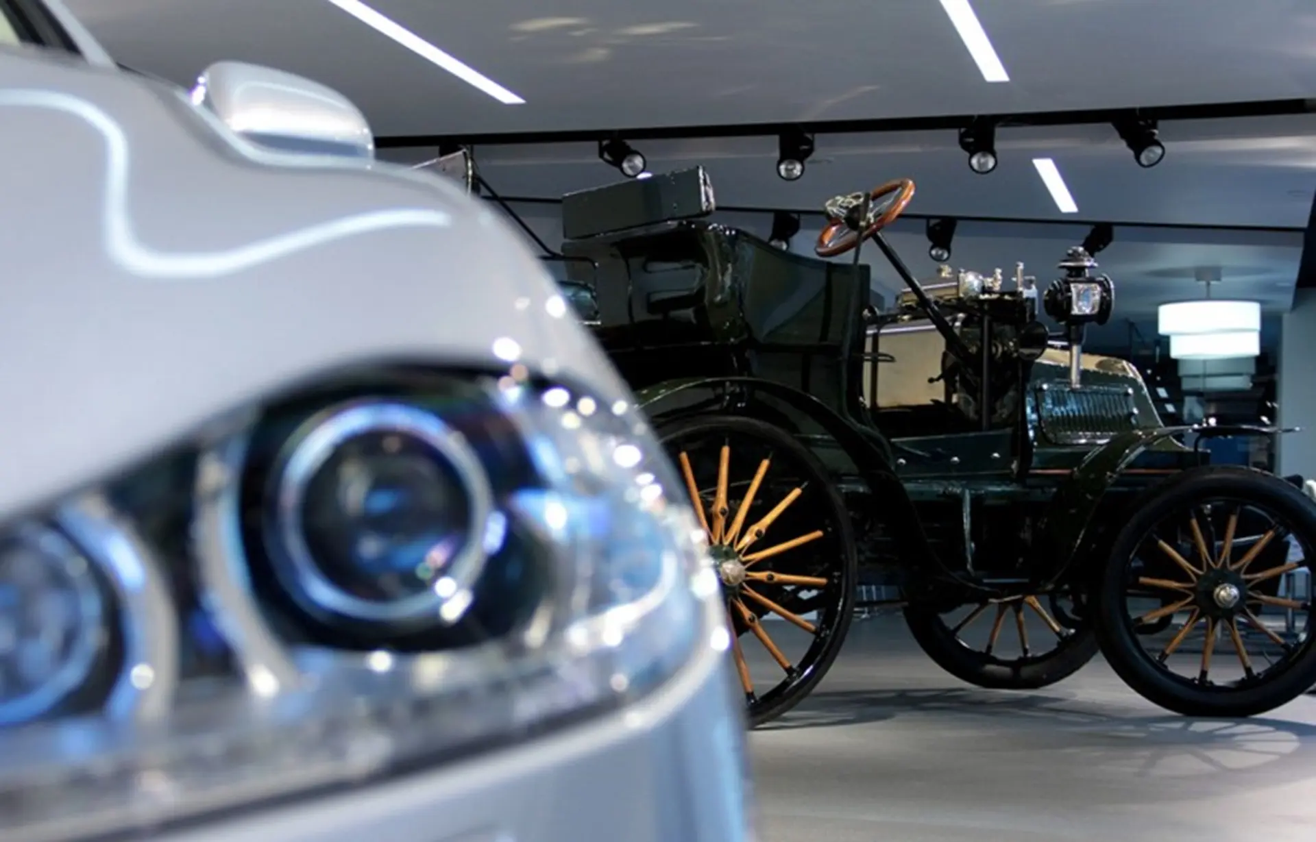 1899 Daimler and 2011 Jaguar XJ on display at SMMT headquarters