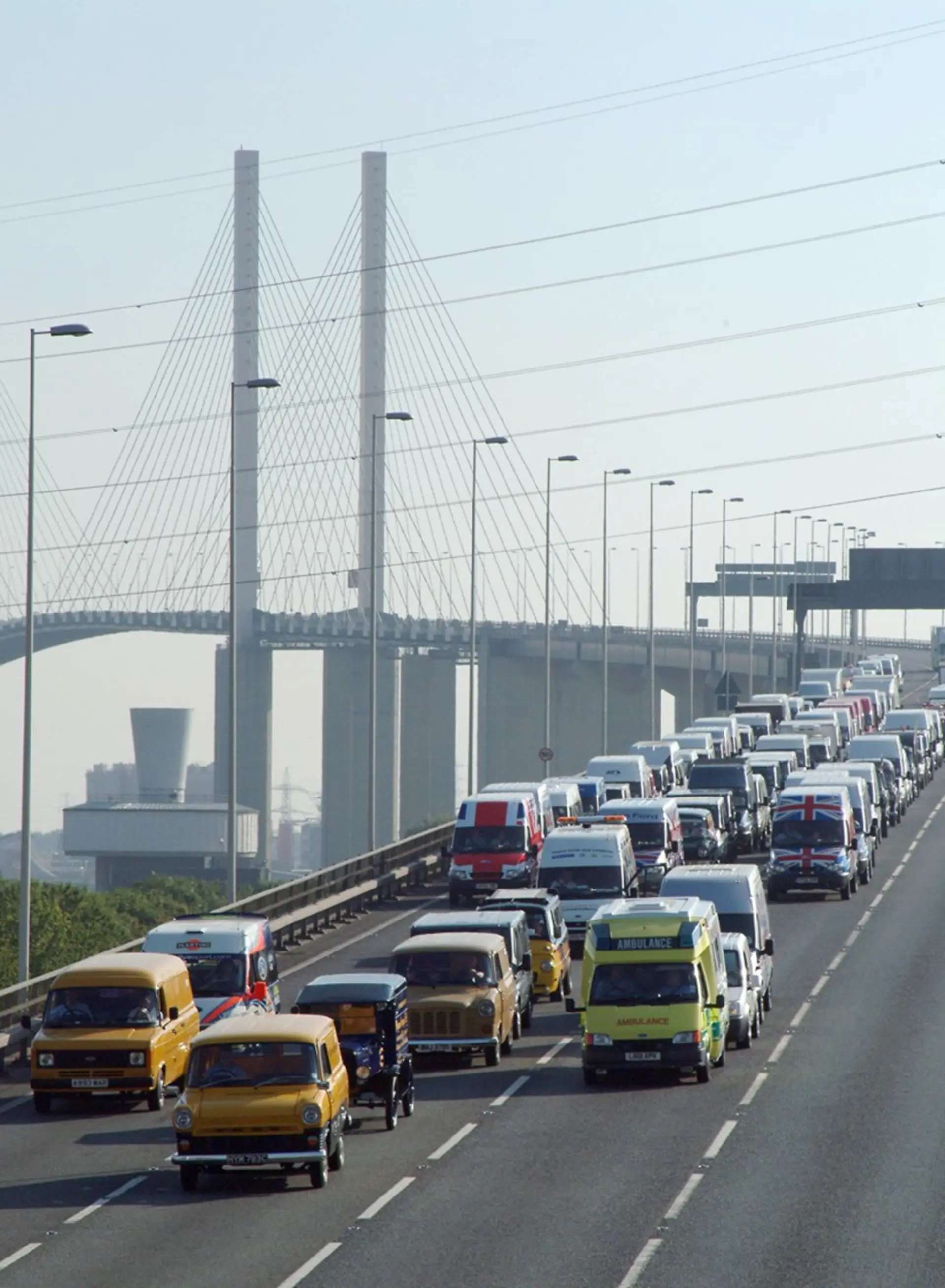 A convoy of Ford vans on the QE2 bridge