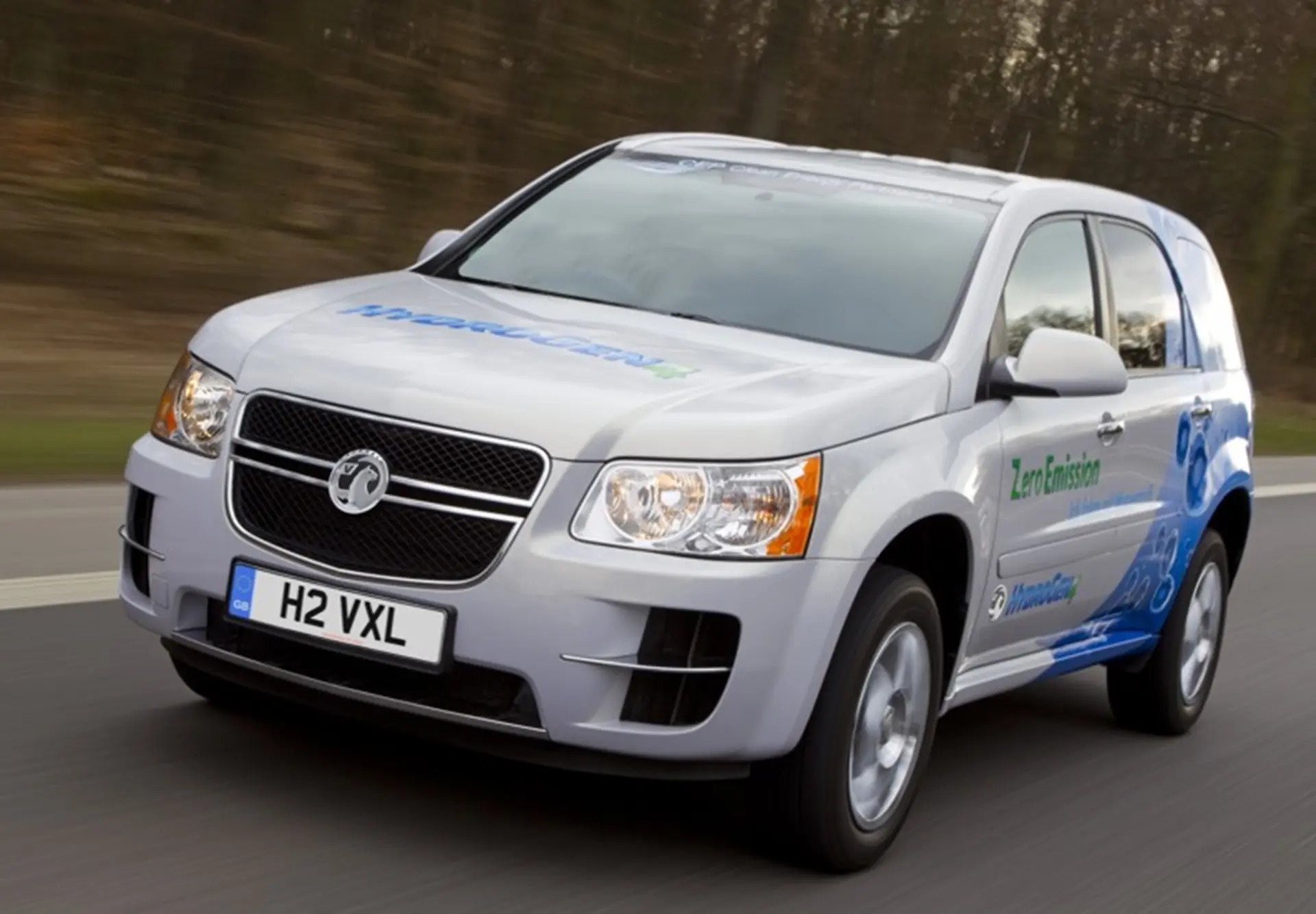 Vauxhall HydroGen4 in front of Vauxhall Retailer