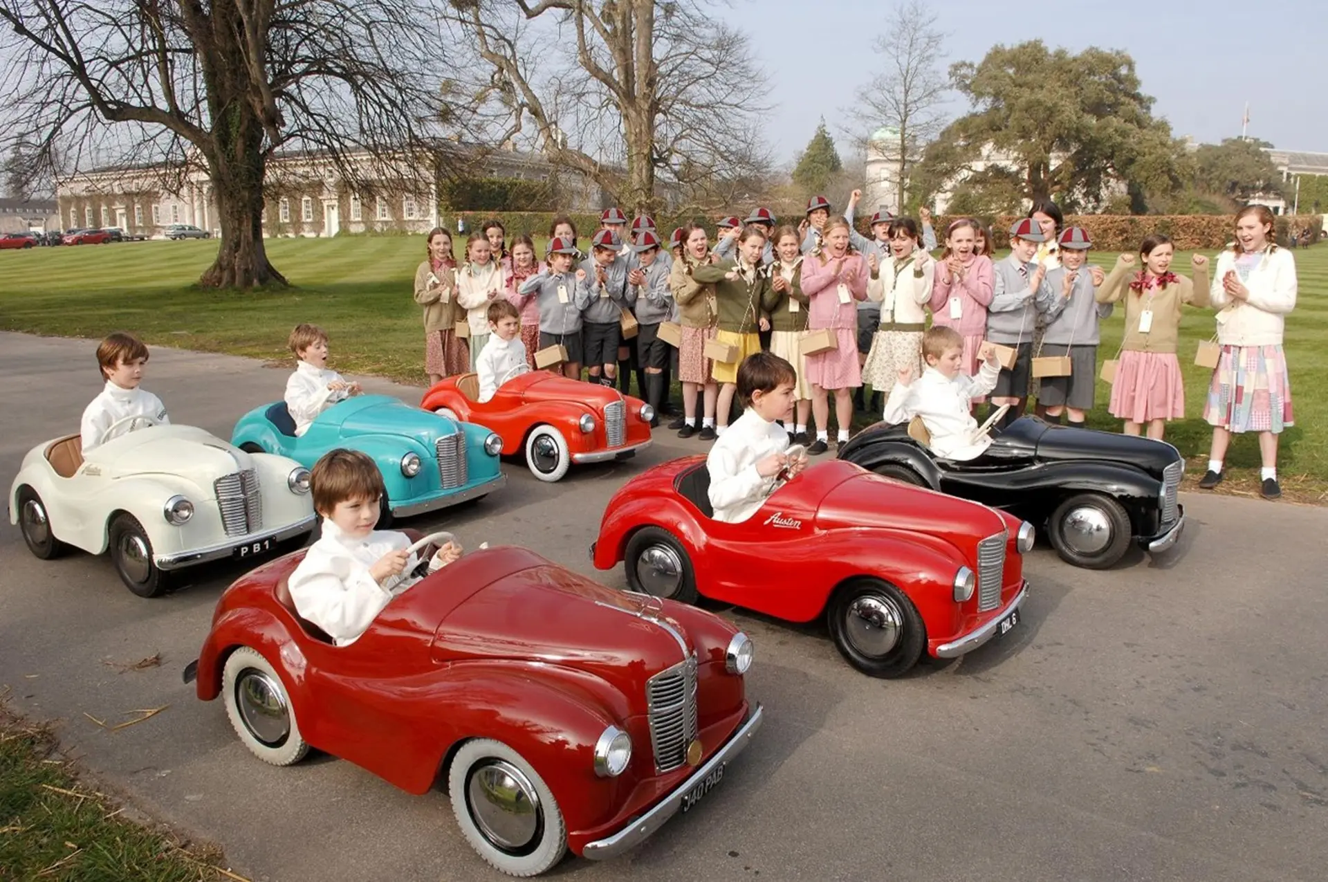 Austin J40 pedal car race at Goodwood Revival