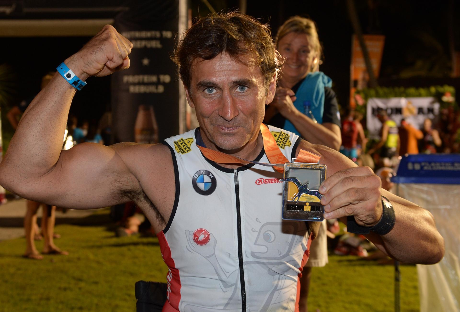 BMW works driver Alessandro Zanardi masters his first long-distance triathlon in Hawaii