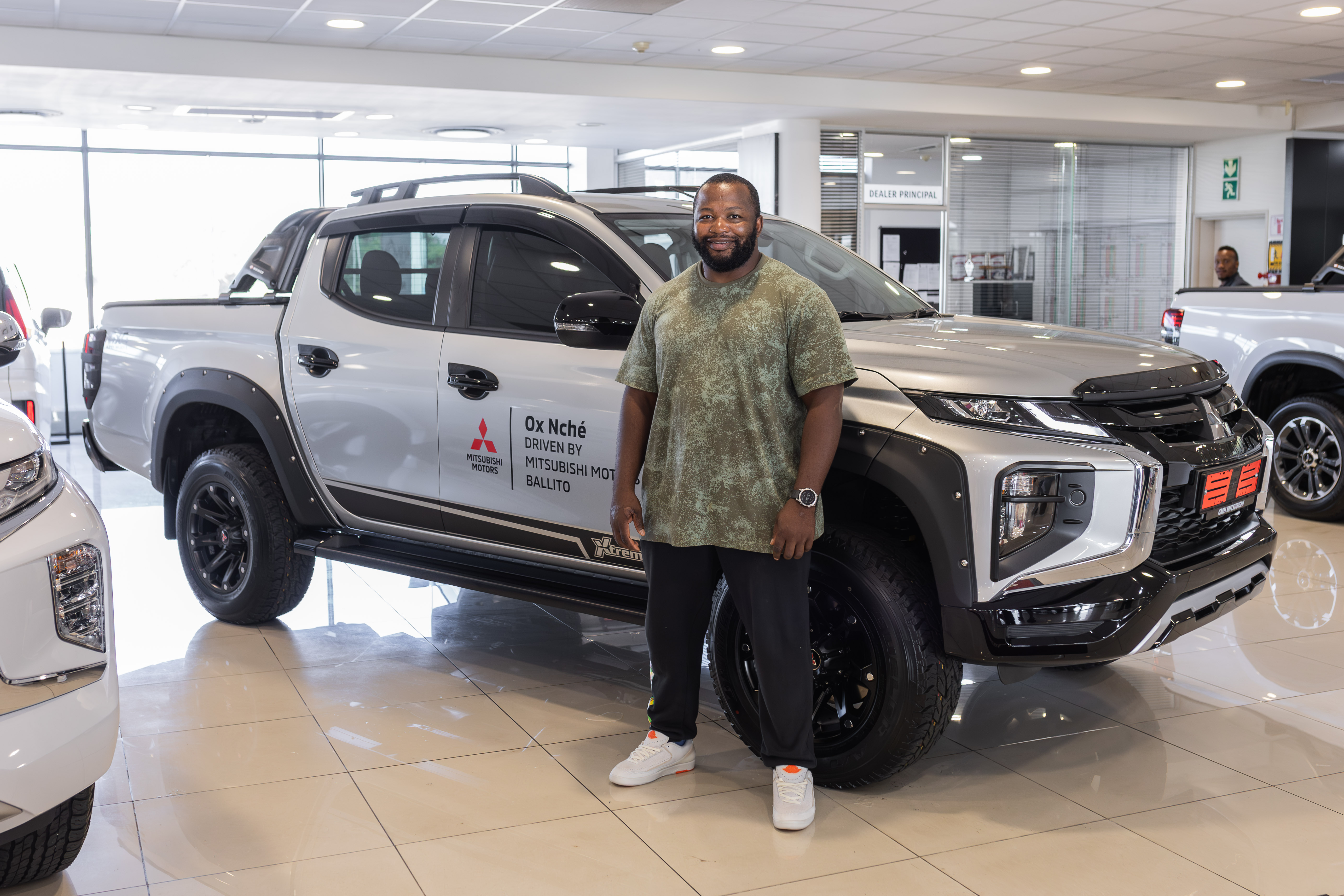 World cup winner ox nche rewarded with mitsubishi triton xtreme